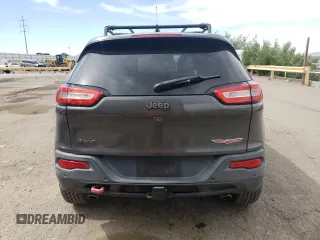 2014 Jeep Cherokee Trailhawk with VIN 1C4PJMBS6EW140981, listed as a Copart auction lot 58260325 with 97,036 mi miles and Salvage title. Bid and sale history available at DreamBid. Image 6.