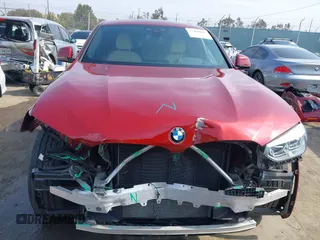 2021 BMW X4 xDrive30i with VIN 5UX2V1C09M9F29509, listed as a IAAI auction lot 42408605 with 46,992 mi miles and . Bid and sale history available at DreamBid. Image 13.