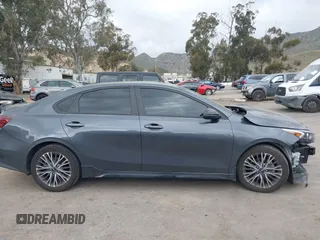 2023 Kia Forte GT-Line z VIN 3KPF54ADXPE598362, wystawiony jako IAAI lot #41857738 z przebiegiem 64 208 mil mil oraz . Historia ofert i sprzedaży dostępna na DreamBid. Obrazek 12.