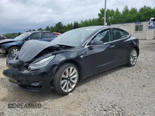 2019 Tesla Model 3 Mid Range z VIN 5YJ3E1EA6KF310938, wystawiony jako Copart lot #54610055 z przebiegiem 87 163 mil mil oraz Szkoda całkowita • Salvage title. Historia ofert i sprzedaży dostępna na DreamBid. Obrazek 1.