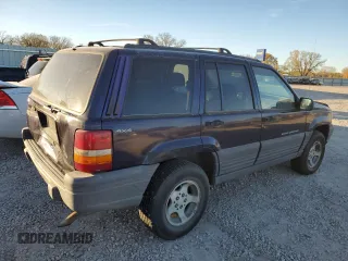 1997 Jeep Grand Cherokee Laredo with VIN 1J4GZ58S7VC685900, listed as a Copart auction lot 82105214 with 151,036 mi miles and Salvage Title. Bid and sale history available at carsss.com. Image 3.