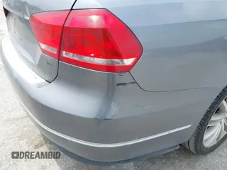2012 Volkswagen Passat S z VIN 1VWAP7A39CC074390, wystawiony jako IAAI lot #42147260 z przebiegiem 114 996 mil mil oraz . Historia ofert i sprzedaży dostępna na DreamBid. Obrazek 13.