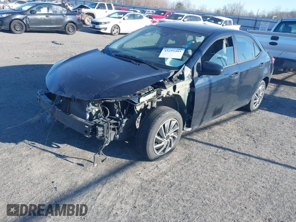 2019 Toyota Corolla L with VIN 2T1BURHE6KC188047, listed as a IAAI auction lot 41695485 with 81,908 mi miles. Bid and sale history available at carsss.com. Image 18.