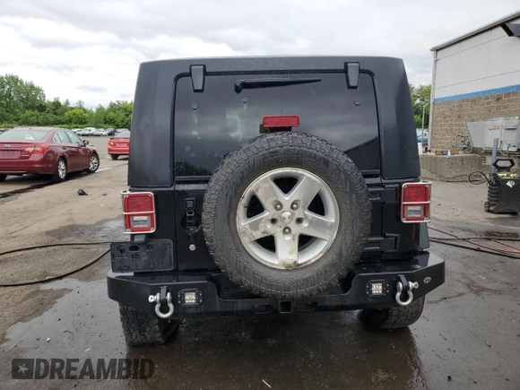 2008 Jeep Wrangler Unlimited Rubicon with VIN 1J4GA691X8L590979, listed as a Copart auction lot 57840575 with 195,458 mi miles and Salvage title. Bid and sale history available at DreamBid. Image 6.