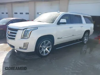 2015 Cadillac Escalade ESV Premium z VIN 1GYS4TKJ9FR700022, wystawiony jako IAAI lot #41748188 z przebiegiem 166 416 mil mil oraz . Historia ofert i sprzedaży dostępna na DreamBid. Obrazek 2.