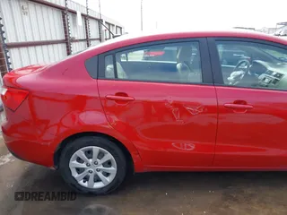 2013 Kia Rio LX with VIN KNADM4A31D6310504, listed as a IAAI auction lot 41579952 with 55,757 mi miles and . Bid and sale history available at DreamBid. Image 20.