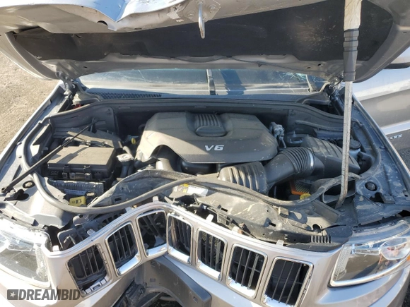 2015 Jeep Grand Cherokee Laredo with VIN 1C4RJFAG4FC675506, listed as a Copart auction lot 54562815 with 112,898 mi miles and Clean Title. Bid and sale history available at carsss.com. Image 12.