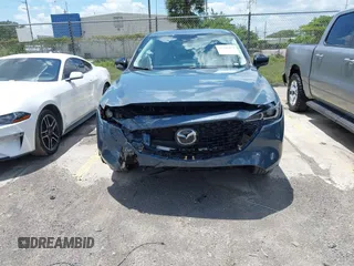 2024 Mazda CX-5 S Carbon Edition with VIN JM3KFBCL3R0505477, listed as a IAAI auction lot 42245851 with 17,954 mi miles and . Bid and sale history available at DreamBid. Image 12.