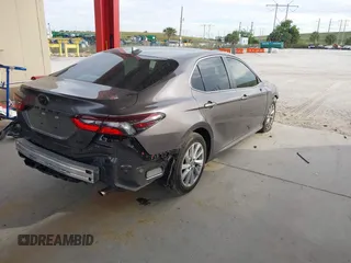 2023 Toyota Camry LE z VIN 4T1C11AK3PU719452, wystawiony jako IAAI lot #38236100 z przebiegiem 34 140 mil mil oraz . Historia ofert i sprzedaży dostępna na DreamBid. Obrazek 4.