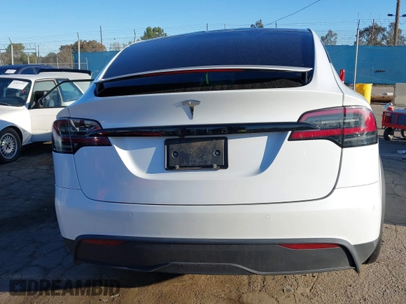 2022 Tesla Model X with VIN 7SAXCBE59NF364984, listed as a IAAI auction lot 41809256 with Not Provided miles and . Bid and sale history available at DreamBid. Image 17.