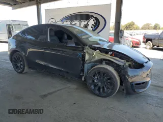 2024 Tesla Model Y Long Range с VIN 7SAYGDEE8RF983280, выставлен на аукционе Copart как лот 55417555 с пробегом 52 273 миль миль и Списание • Salvage title. История ставок и продаж доступна на DreamBid. Изображение 4.