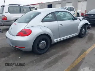 2013 Volkswagen Beetle with VIN 3VWHX7ATXDM658134, listed as a IAAI auction lot 42097779 with 47,901 mi miles and . Bid and sale history available at DreamBid. Image 4.