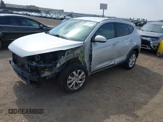 2019 Hyundai Tucson Value with VIN KM8J3CA46KU962082, listed as a IAAI auction lot 42160288 with 92,887 mi miles and . Bid and sale history available at DreamBid. Image 18.