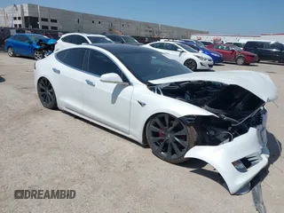 2020 Tesla Model S Performance with VIN 5YJSA1E49LF360655, listed as a IAAI auction lot 42777670 with Not provided miles and . Bid and sale history available at DreamBid. Image 1.