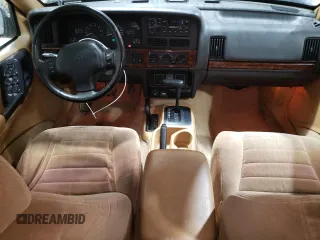 1997 Jeep Grand Cherokee Laredo with VIN 1J4GZ58S6VC573007, listed as a Copart auction lot 42728355 with 164,269 mi miles and Salvage Title. Bid and sale history available at carsss.com. Image 8.