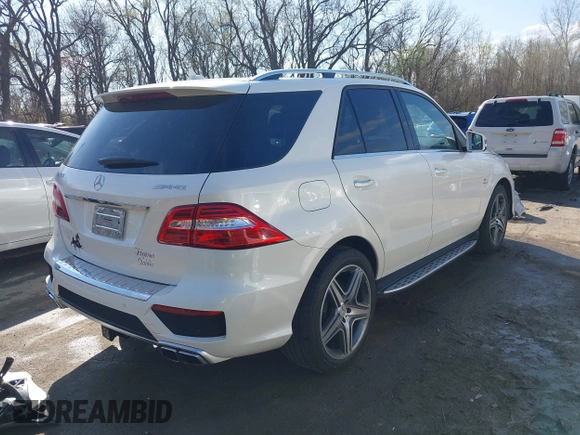 2015 Mercedes-Benz M 63 AMG with VIN 4JGDA7EB6FA471585, listed as a IAAI auction lot 41883006 with 39,243 mi miles and . Bid and sale history available at carsss.com. Image 4.