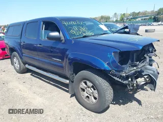2014 Toyota Tacoma with VIN 3TMLU4EN4EM154261, listed as a IAAI auction lot 42119237 with 211,929 mi miles and . Bid and sale history available at DreamBid. Image 1.