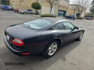1997 Jaguar XK with VIN SAJGX5747VC007213, listed as a Copart auction lot 45953175 with 82,461 mi miles and Clean Title. Bid and sale history available at DreamBid. Image 4.