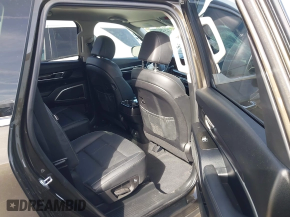 2023 Kia Telluride S with VIN 5XYP6DGC0PG334800, listed as a IAAI auction lot 42078611 with 27,486 mi miles and . Bid and sale history available at DreamBid. Image 8.