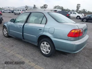 1999 Honda Civic EX z VIN 2HGEJ8643XH532751, wystawiony jako IAAI lot #42020290 z przebiegiem 239 316 mil mil oraz . Historia ofert i sprzedaży dostępna na DreamBid. Obrazek 3.