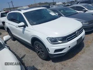 2021 Volkswagen Tiguan SE z VIN 3VV2B7AX7MM035856, wystawiony jako IAAI lot #42312001 z przebiegiem 65 424 mil mil oraz . Historia ofert i sprzedaży dostępna na DreamBid. Obrazek 1.