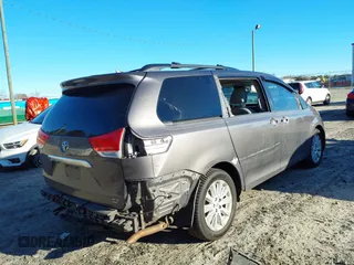 2011 Toyota Sienna XLE with VIN 5TDDK3DC8BS009739, listed as a IAAI auction lot 41638710 with 235,396 mi miles. Bid and sale history available at carsss.com. Image 4.