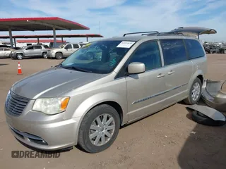 2014 Chrysler Town & Country Touring with VIN 2C4RC1BG9ER272798, listed as a IAAI auction lot 41555830 with 120,611 mi miles and . Bid and sale history available at DreamBid. Image 2.