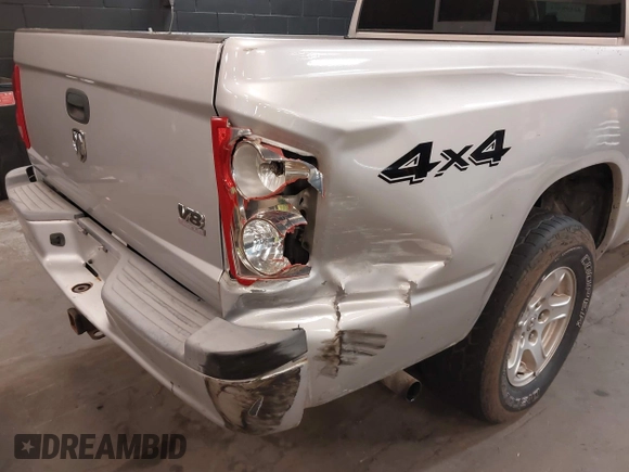 2005 Dodge Dakota SLT with VIN 1D7HW48N15S164352, listed as a IAAI auction lot 42190403 with 150,794 mi miles. Bid and sale history available at carsss.com. Image 6.
