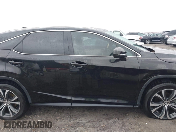 2021 Lexus RX with VIN 2T2HZMAA0MC201749, listed as a IAAI auction lot 41426758 with 148,064 mi miles. Bid and sale history available at carsss.com. Image 13.