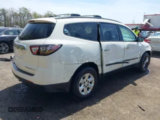 2015 Chevrolet Traverse LS z VIN 1GNKVFED8FJ257149, wystawiony jako IAAI lot #42060101 z przebiegiem 150 738 mil mil oraz . Historia ofert i sprzedaży dostępna na DreamBid. Obrazek 4.