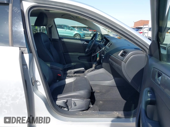2014 Volkswagen Jetta TDI w/Premium with VIN 3VWLL7AJ6EM424935, listed as a IAAI auction lot 41533634 with 64,028 mi miles and . Bid and sale history available at DreamBid. Image 5.