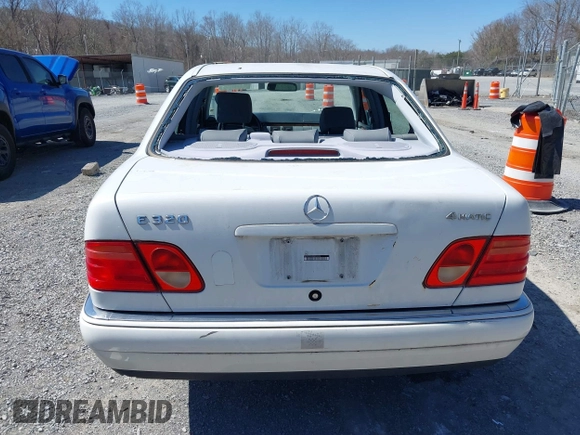 1999 Mercedes-Benz E-Class with VIN WDBJF82H4XX025925, listed as a IAAI auction lot 41839398 with 238,583 mi miles. Bid and sale history available at carsss.com. Image 16.