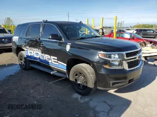 2015 Chevrolet Tahoe Commercial with VIN 1GNLC2ECXFR591789, listed as a Copart auction lot 54121265 with 111,326 mi miles and Salvage title. Bid and sale history available at DreamBid. Image 4.