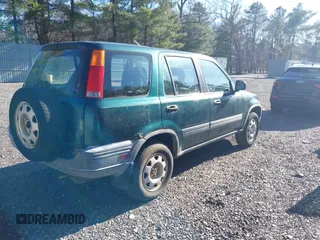 2001 Honda CR-V LX with VIN JHLRD18431C016561, listed as a IAAI auction lot 41770542 with 135,447 mi miles. Bid and sale history available at carsss.com. Image 4.