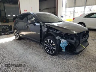 2019 Mazda CX-3 Touring z VIN JM1DKFC75K1439294, wystawiony jako Copart lot #52967955 z przebiegiem 16 966 mil mil oraz Czysty tytuł • Clean title. Historia ofert i sprzedaży dostępna na DreamBid. Obrazek 4.