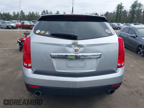 2014 Cadillac SRX Luxury Collection z VIN 3GYFNEE33ES670356, wystawiony jako IAAI lot #42008087 z przebiegiem 59 953 mil mil oraz . Historia ofert i sprzedaży dostępna na DreamBid. Obrazek 18.