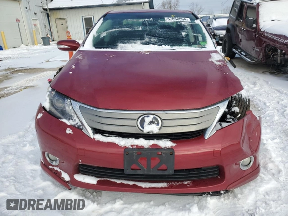 2010 Lexus HS 250h with VIN JTHBB1BA3A2016079, listed as a Copart auction lot 87058094 with Not Provided miles and Salvage Title. Bid and sale history available at DreamBid. Image 5.
