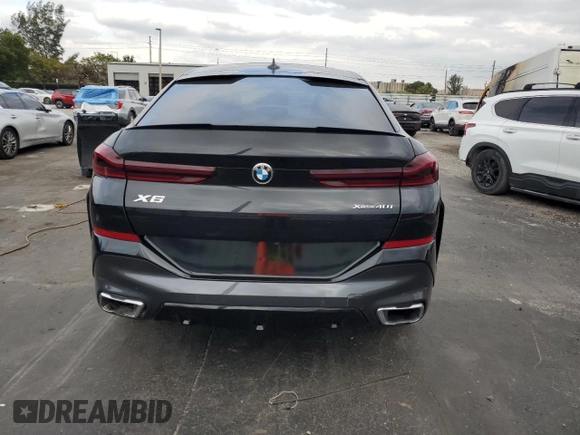 2021 BMW X6 xDrive40i with VIN 5UXCY6C00M9E08487, listed as a Copart auction lot 46477895 with 34,000 mi miles and Salvage Title. Bid and sale history available at carsss.com. Image 6.