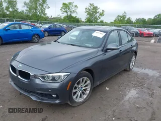 2018 BMW 3 Series 320i xDrive with VIN WBA8A3C5XJA505917, listed as a IAAI auction lot 42279882 with 89,537 mi miles and . Bid and sale history available at DreamBid. Image 2.