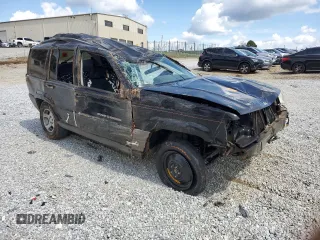 1996 Jeep Grand Cherokee Laredo with VIN 1J4FX58S6TC349590, listed as a Copart auction lot 72278714 with 0 mi miles and Salvage Title. Bid and sale history available at carsss.com. Image 4.