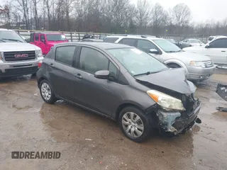 2012 Toyota Yaris L with VIN JTDKTUD34CD524342, listed as a IAAI auction lot 41571712 with 135,744 mi miles. Bid and sale history available at carsss.com. Image 1.