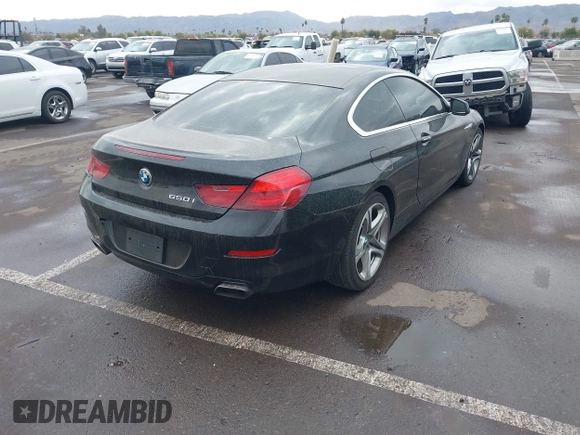 2012 BMW 6 Series 650i with VIN WBALX3C57CDV77359, listed as a IAAI auction lot 41443966 with 64,500 mi miles. Bid and sale history available at carsss.com. Image 4.