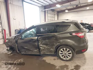 2017 Ford Escape Titanium with VIN 1FMCU9JD7HUE46427, listed as a IAAI auction lot 41808083 with 55,201 mi miles. Bid and sale history available at carsss.com. Image 15.