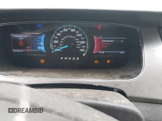 2014 Ford Taurus SEL z VIN 1FAHP2E8XEG133992, wystawiony jako IAAI lot #42223678 z przebiegiem 201 204 mil mil oraz . Historia ofert i sprzedaży dostępna na DreamBid. Obrazek 7.