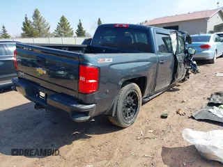 2017 Chevrolet Silverado 1500 LT with VIN 3GCUKREC6HG451671, listed as a IAAI auction lot 41906060 with Not Provided miles and . Bid and sale history available at DreamBid. Image 4.