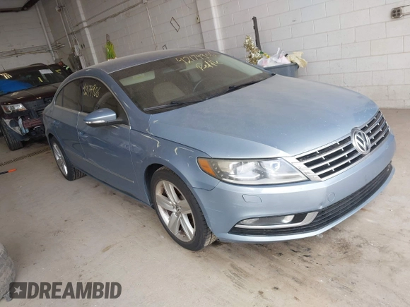 2013 Volkswagen CC Sport with VIN WVWBP7AN1DE567561, listed as a IAAI auction lot 42174906 with 157,827 mi miles. Bid and sale history available at carsss.com. Image 1.