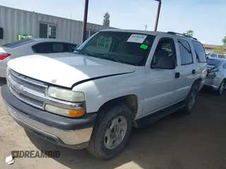 2004 Chevrolet Tahoe LS with VIN 1GNEC13V24J290596, listed as a IAAI auction lot 41956638 with 199,004 mi miles. Bid and sale history available at carsss.com. Image 2.