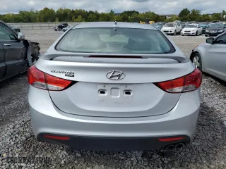 2013 Hyundai Elantra Coupe GS PZEV with VIN KMHDH6AE2DU023460, listed as a Copart auction lot 71382144 with 124,578 mi miles and Salvage Title. Bid and sale history available at carsss.com. Image 6.