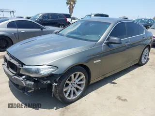 2014 BMW 5 Series 535i xDrive with VIN WBA5B3C57ED531072, listed as a IAAI auction lot 42574991 with 104,304 mi miles and . Bid and sale history available at DreamBid. Image 2.