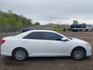 2012 Toyota Camry L z VIN 4T1BF1FKXCU525596, wystawiony jako IAAI lot #42076132 z przebiegiem 197 164 mil mil oraz . Historia ofert i sprzedaży dostępna na DreamBid. Obrazek 13.